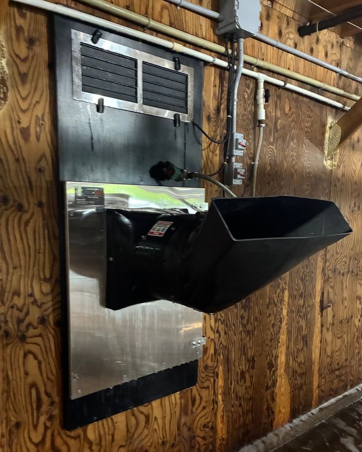After: the same heater washed back to black metal and stainless